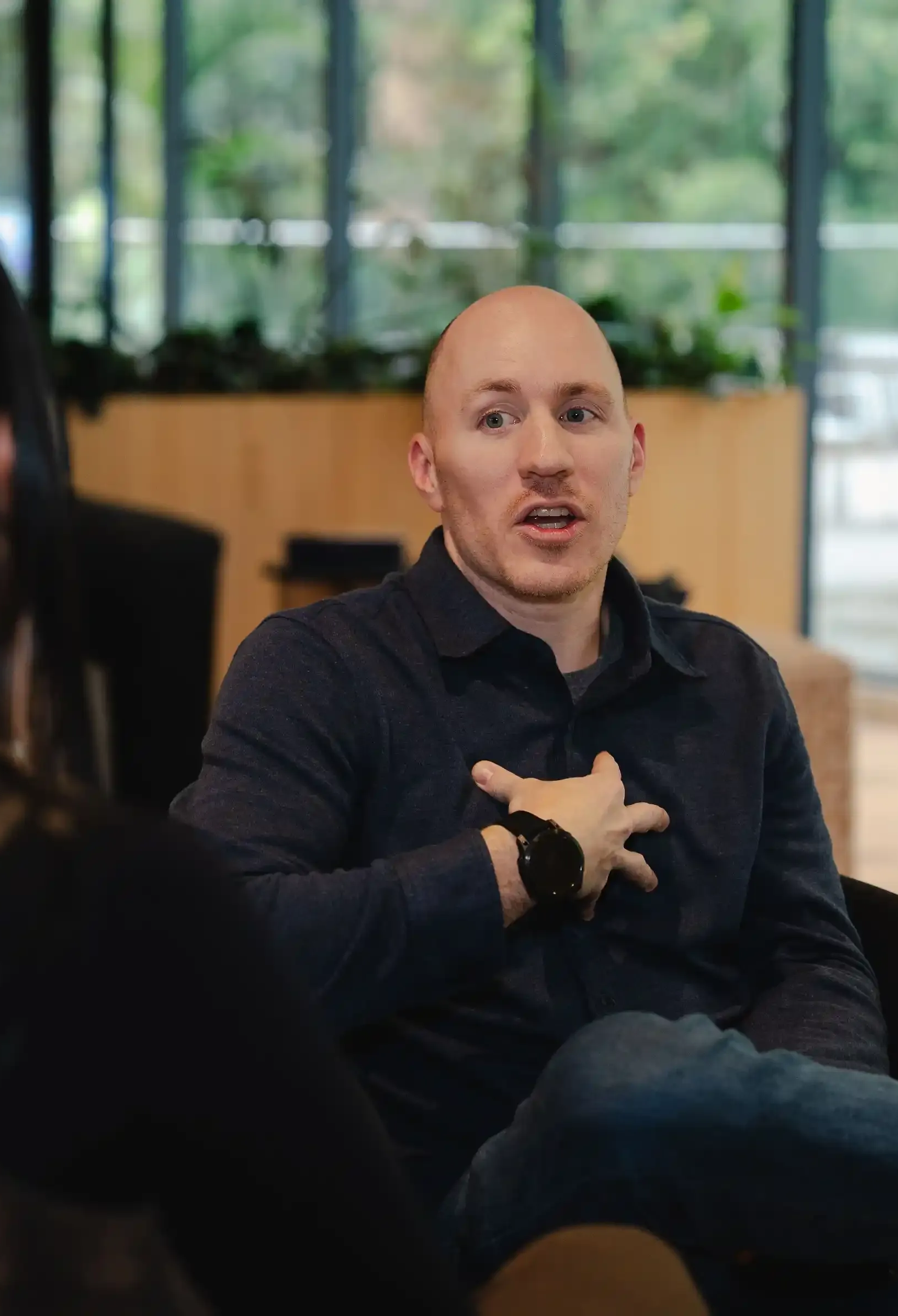 Coach Adam Broda Sitting Speaking with Career Transition Coaching Client