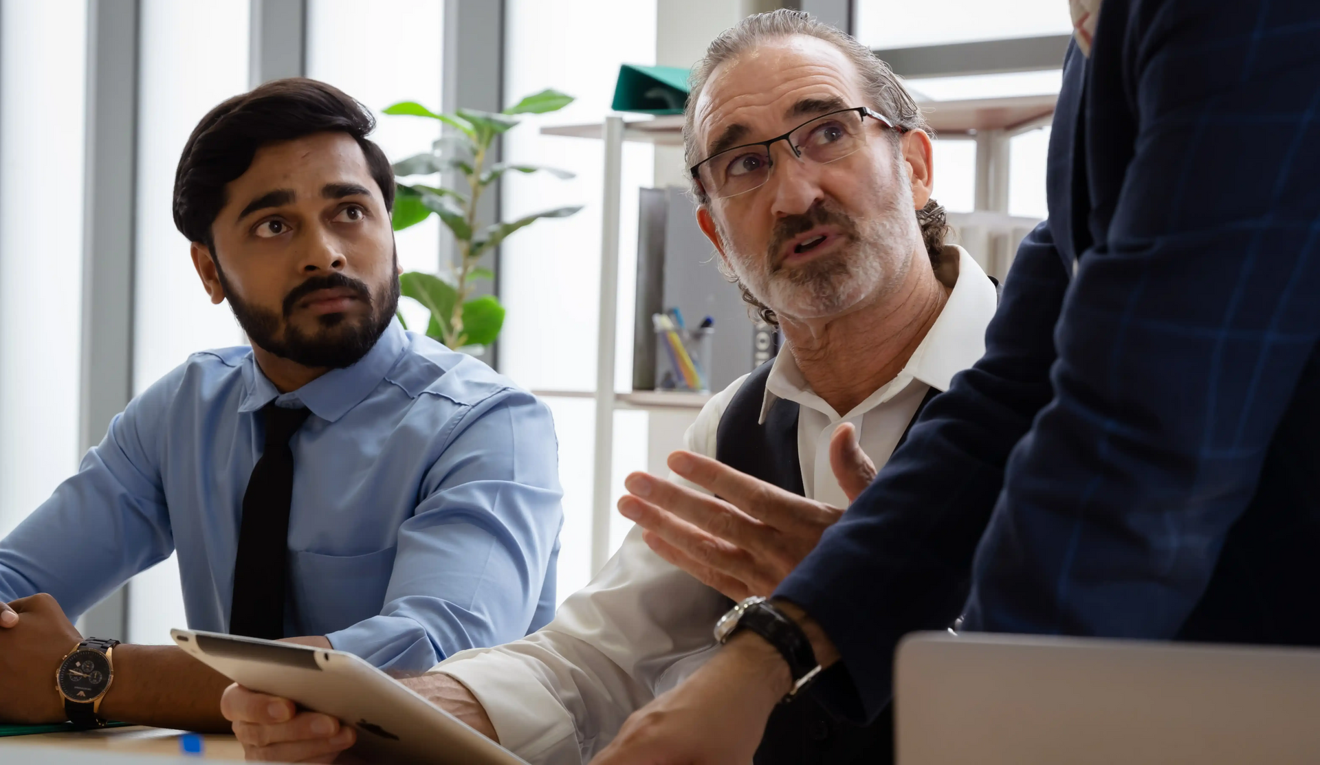 Executive Leader Discussing Customer Experience Strategy With Team