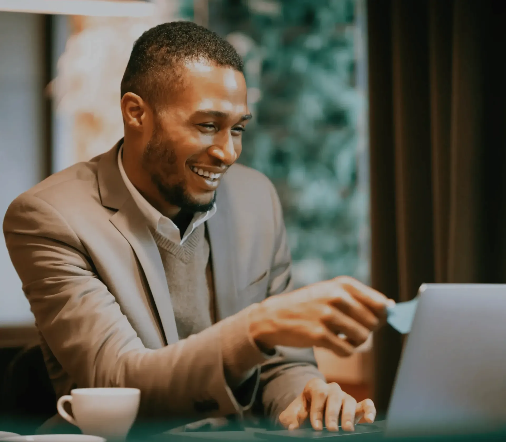 Senior Level Professional Smiling During Virtual Coffee Chat with LinkedIn Connection