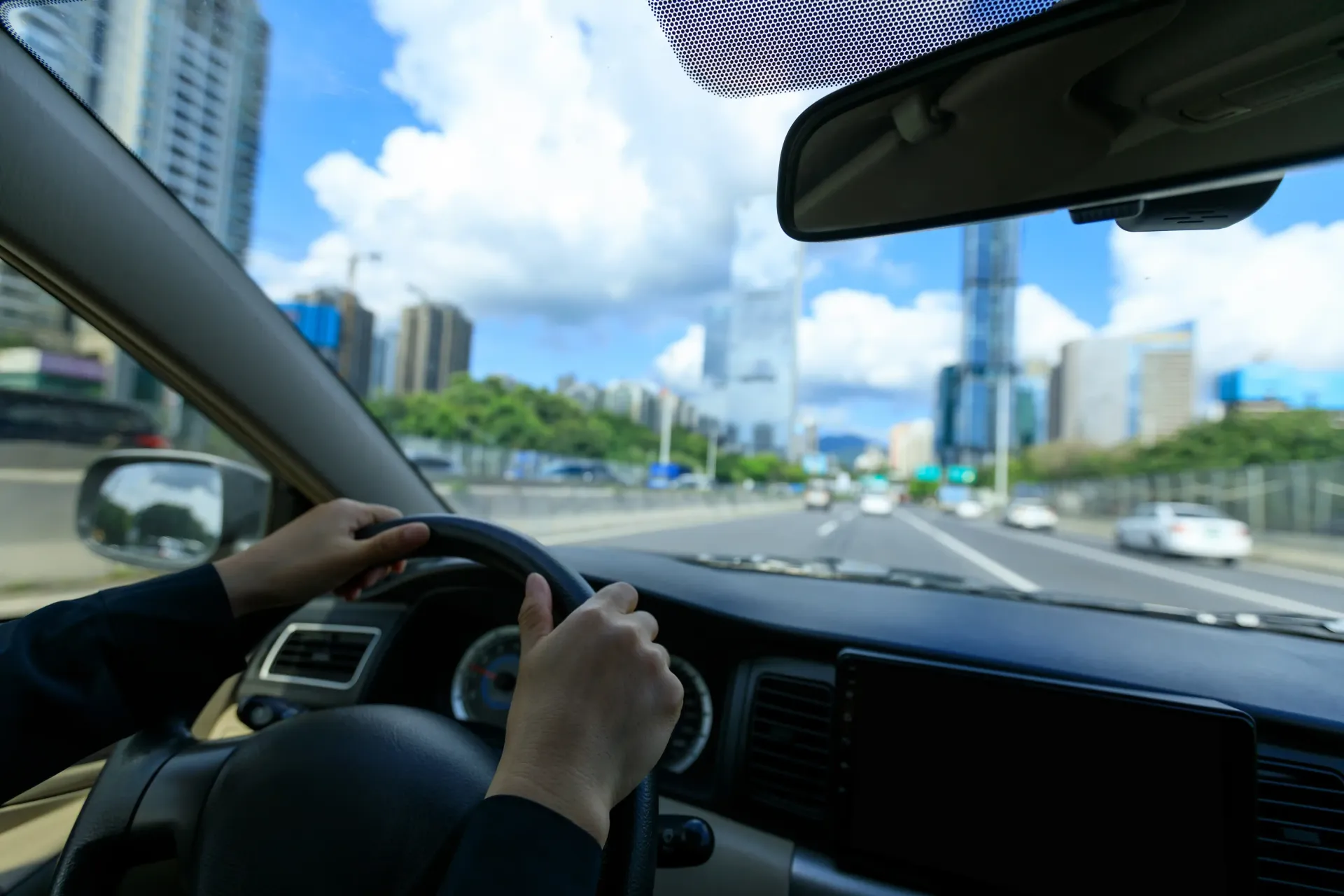 Senior Level Professional Driving to Another City for Networking Event