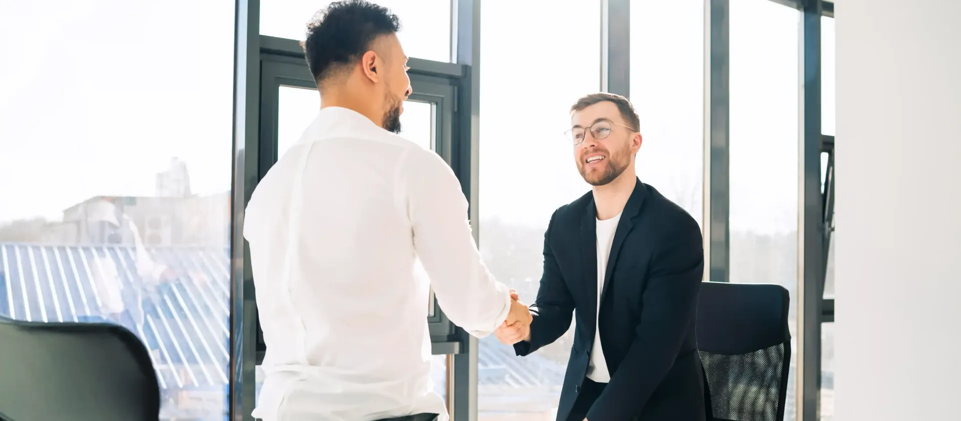 Senior Level Professional Shaking Hands after Receiving Job Offer