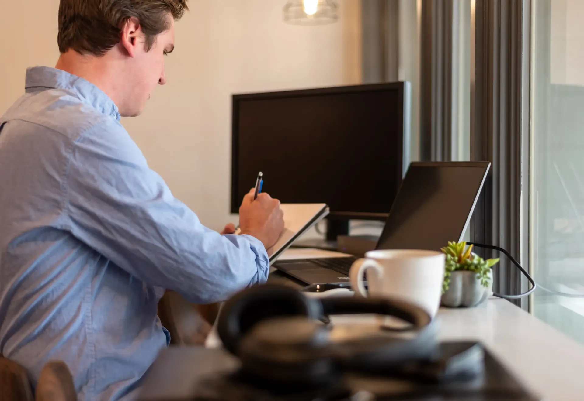 Senior Level Professional Working on Career Strategy at Home