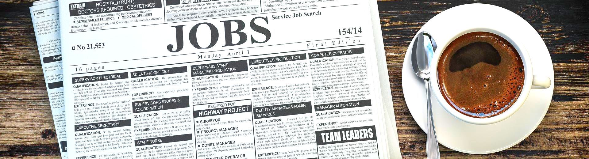 Hiring Trends for 2025 Informational Newspaper With Coffee Next to it on Table