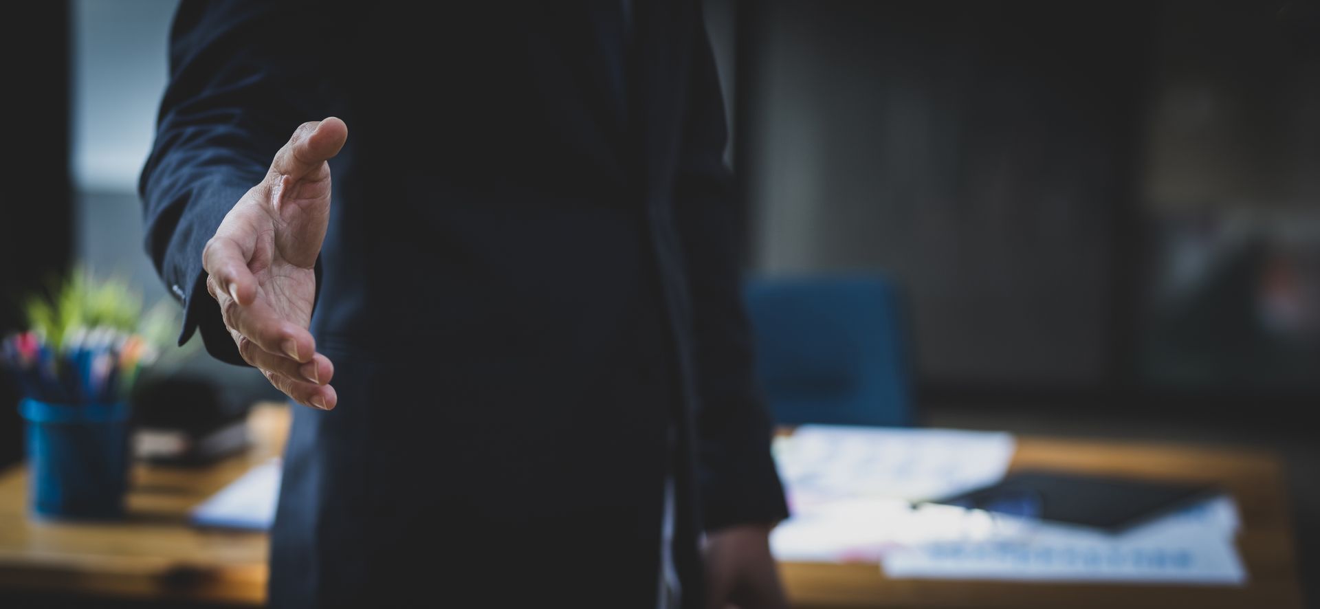 Senior Level Professional Preparing to Shake Hand of Interviewer