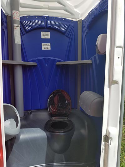 Septic tank company — Inside of Blue New Portable Toilet in North Hanover, NJ