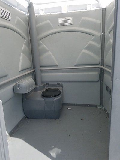 Septic Tank NJ — Inside of Grey New Portable Toilet in North Hanover, NJ