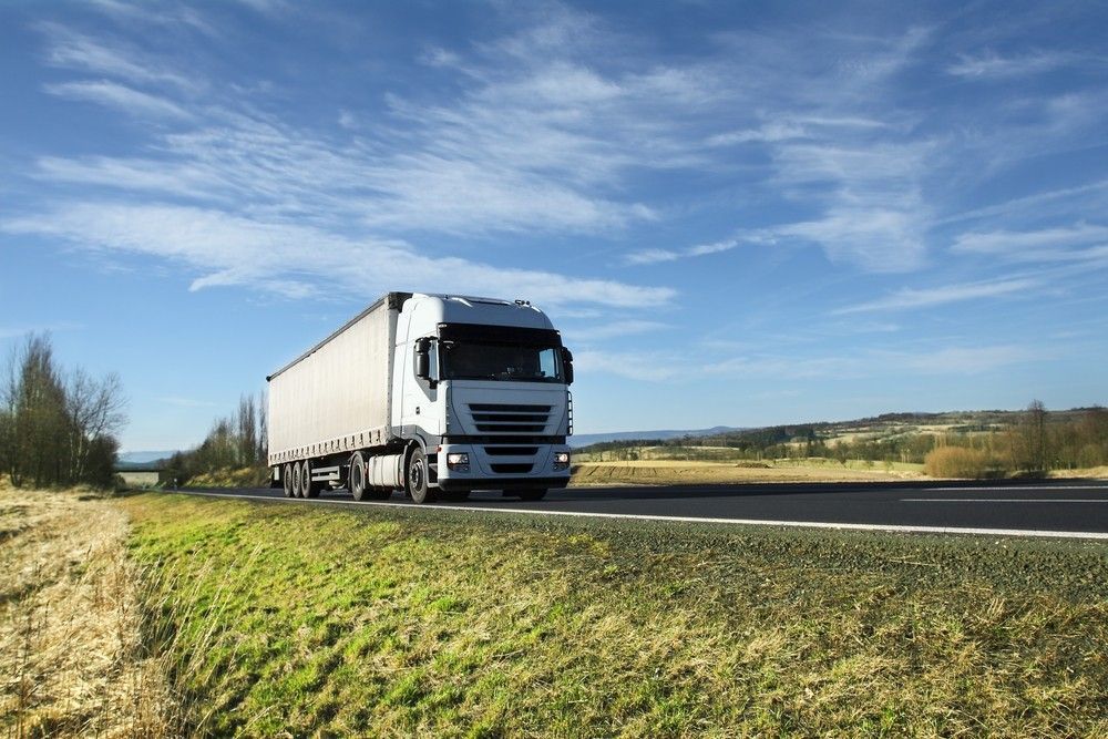 Low angle view of truck on country road