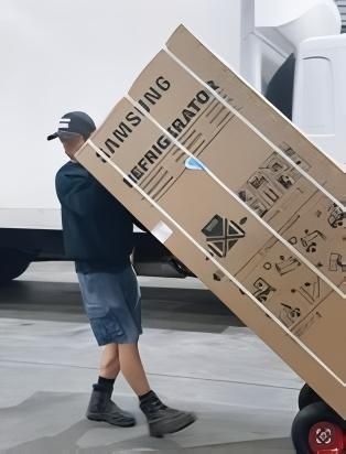 A Man is Carrying a Large Samsung Refrigerator — Easy Choice Removals and General Freight In Port Macquarie, NSW