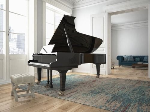 A Grand Piano is Sitting in a Living Room Next to a Window — Easy Choice Removals and General Freight In Port Macquarie, NSW