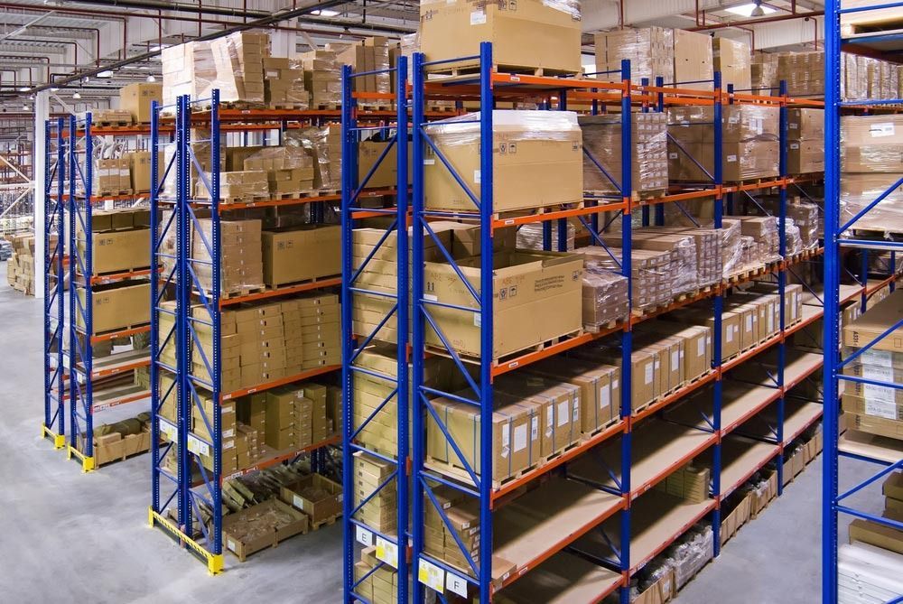 A Warehouse Filled With Lots of Boxes and Shelves — Easy Choice Removals and General Freight In Port Macquarie, NSW
