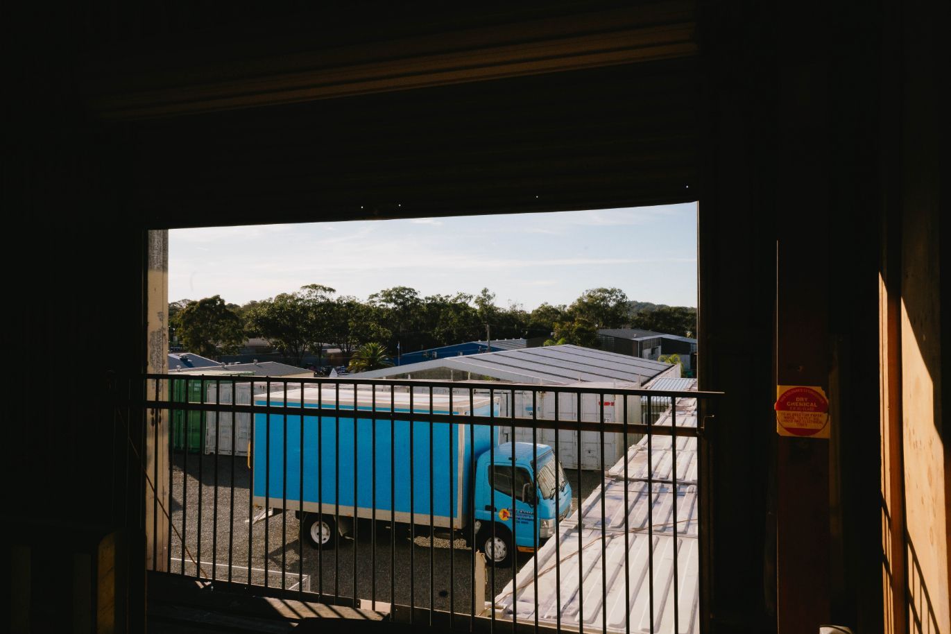 Blue Delivery Truck Parked Outside Loading Bay — Easy Choice Removals and General Freight in Coffs Harbour, NSW