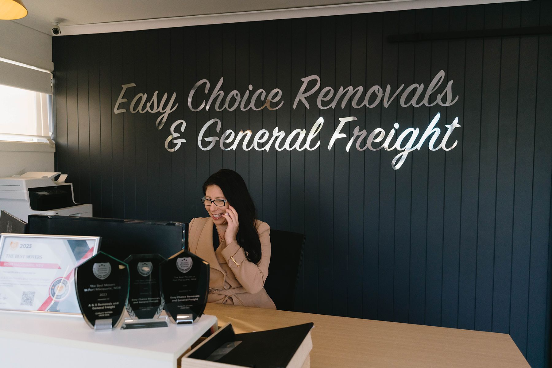 Easy Choice Removals reception area with receptionist speaking on the phone