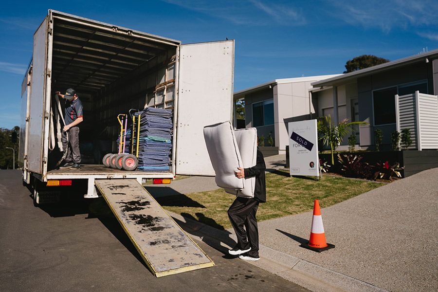 Movers Loading Truck With Furniture — Easy Choice Removals and General Freight in Ballina, NSW