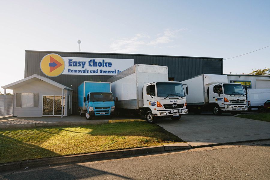 Easy Choice Removals Building With Removal Trucks Parked — Easy Choice Removals and General Freight in Taree, NSW