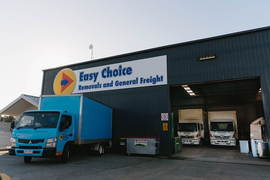 Blue Delivery Truck At The Loading Dock — Easy Choice Removals and General Freight In Port Macquarie, NSW