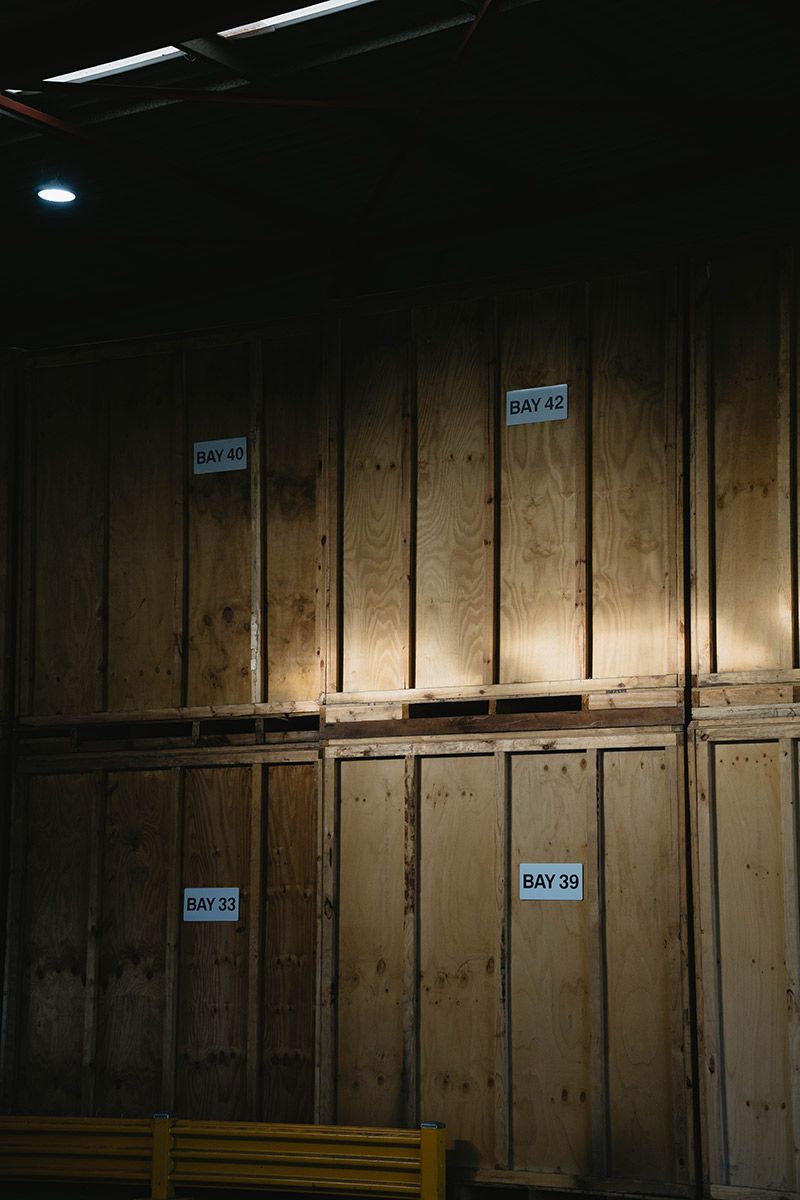 Wooden Crates Stacked In A Warehouse — Easy Choice Removals and General Freight In Port Macquarie, NSW