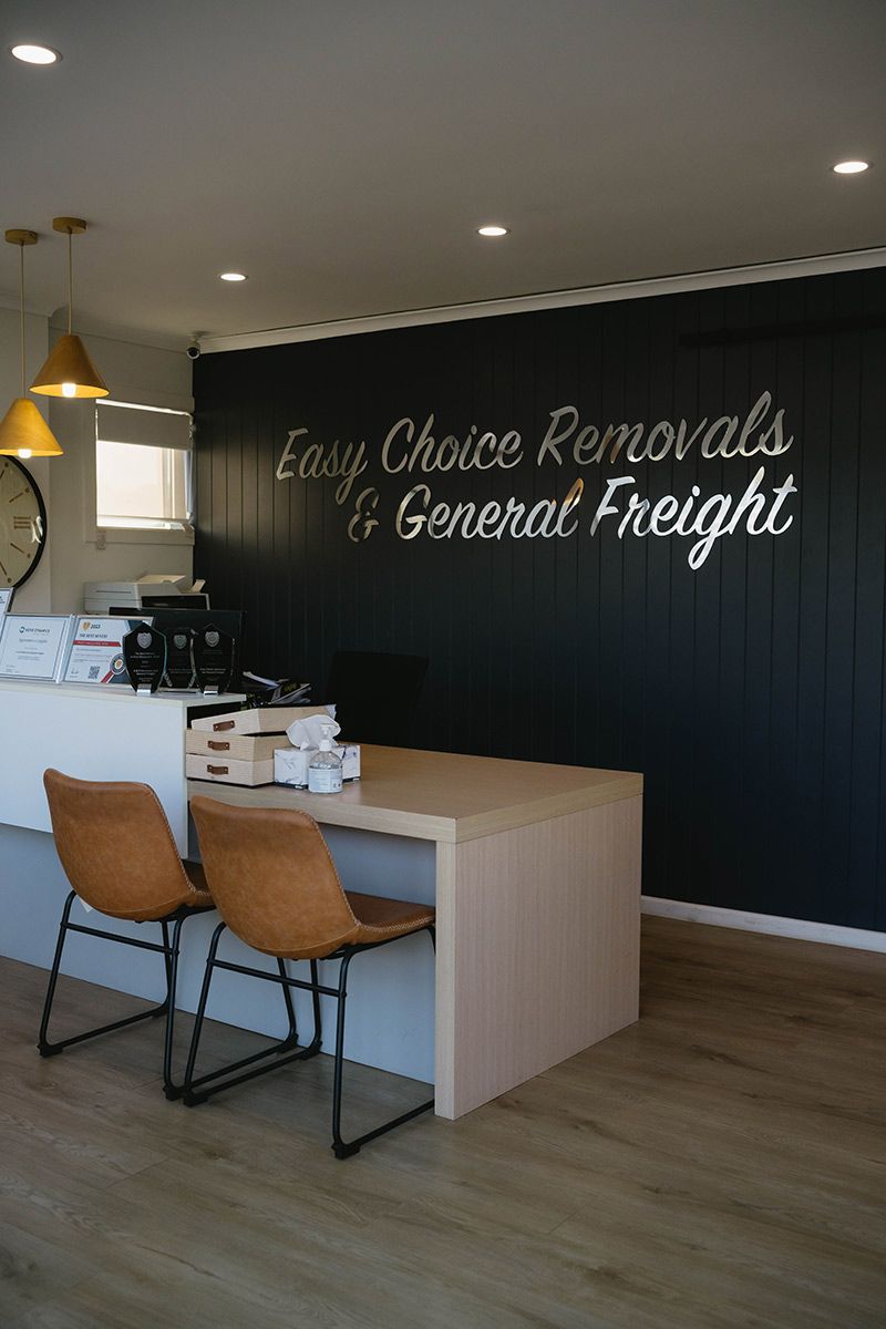 Office With Desk, Chairs, and Sign — Easy Choice Removals and General Freight In Tweed Heads, NSW