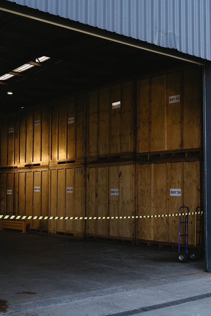 Large Wooden Storage Crates Inside A Warehouse — Easy Choice Removals and General Freight In Northern NSW, NSW