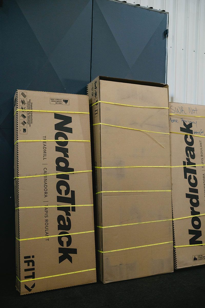 Cardboard Boxes Secured With Yellow Bands — Easy Choice Removals and General Freight In Port Macquarie, NSW