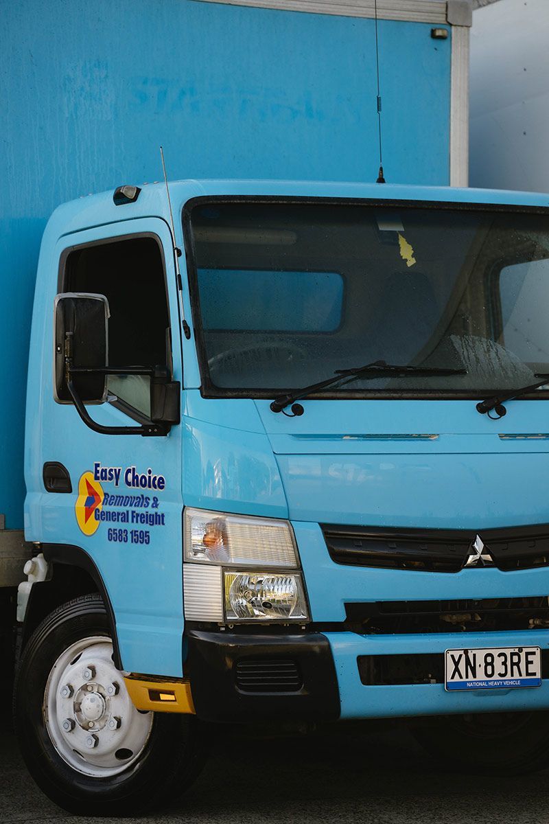 Light Blue Delivery Truck — Easy Choice Removals and General Freight in Forster, NSW