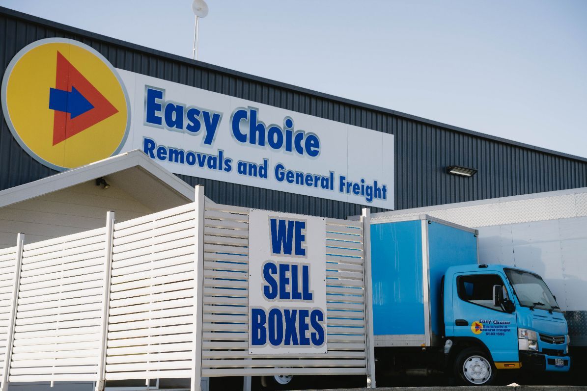 A Moving Truck is Parked on the Side of the Road — Easy Choice Removals and General Freight In Port Macquarie, NSW