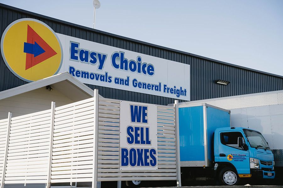 Easy Choice Removals Sign With a Blue Truck — Easy Choice Removals and General Freight In Gold Coast, NSW