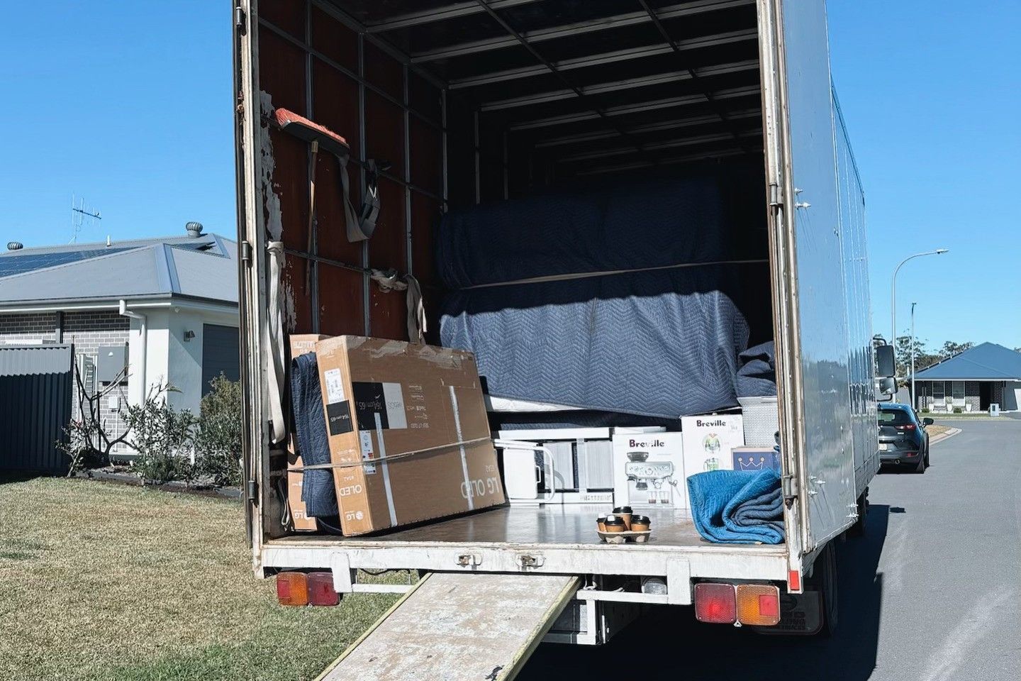Removalists Truck Parked On The Side Of The Road