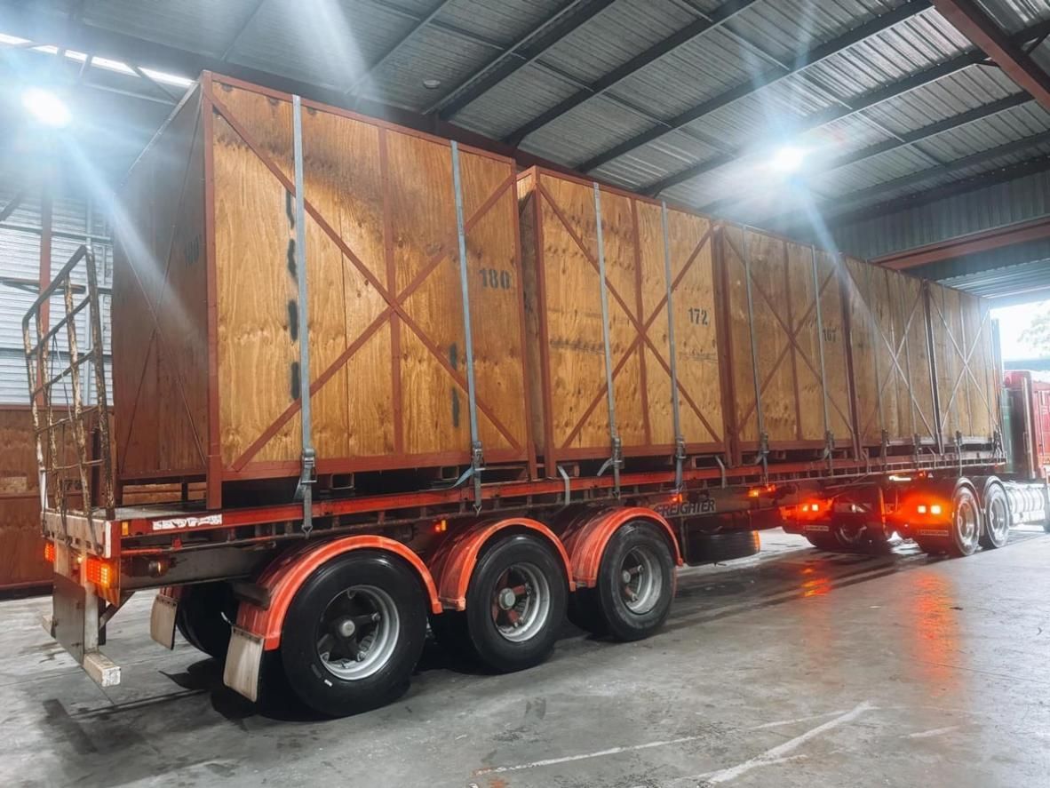 A Truck With Wooden Crates on the Back — Easy Choice Removals and General Freight In Port Macquarie, NSW