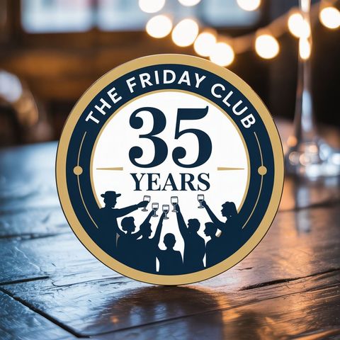 A logo for the friday club sits on a wooden table