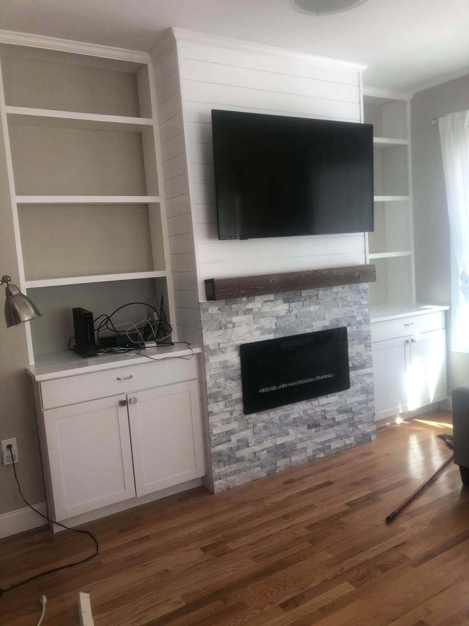 Person measuring and marking wood planks in a workshop. Person measuring and marking wood planks in a workshop.