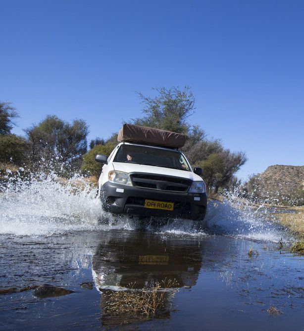 Off-Road Car Crossing a River — Mechanic in Mission Beach, QLD