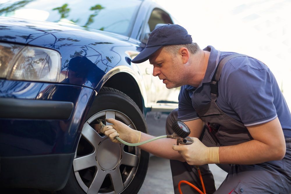 Checking the Tyre Air Pressure — Mechanic in Mission Beach, QLD