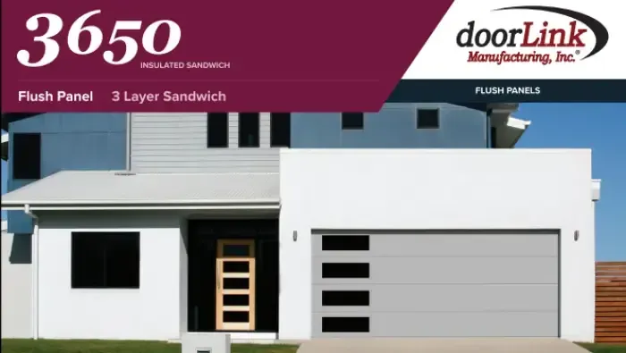 A modern house with a gray, flush-panel garage door featuring four horizontal windows, branded by doorLink Manufacturing.