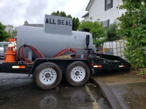 A trailer with a tank on it that says all seal