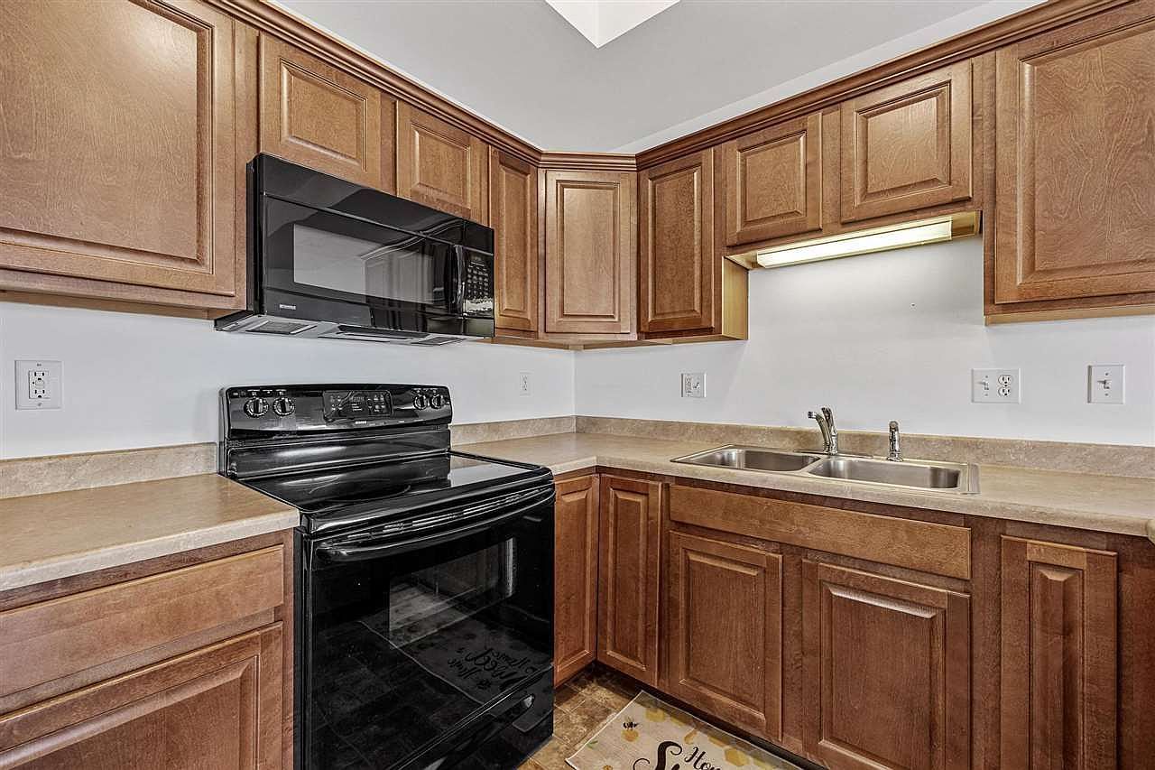 dark cabinets and dated door styles