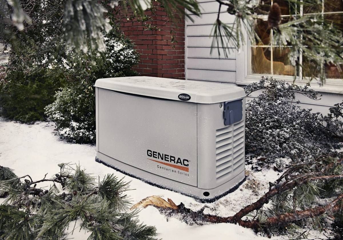 Image of a Generac® backup generator outside of a residential home surrounded by snow and bushes near Dallas-Fort Worth, TX