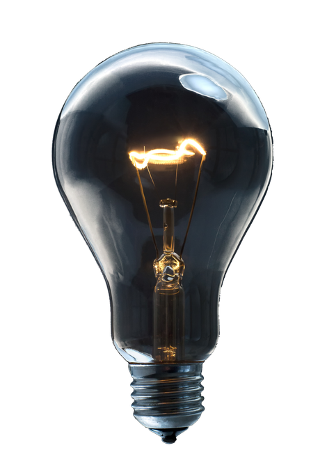 Lit incandescent lightbulb against a black background; filament glows orange.