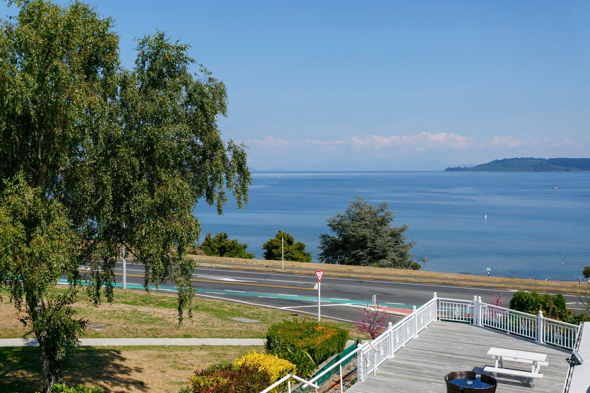 A view of a large body of water from a balcony.