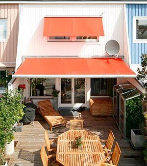 Orange Awning Over Terrace — shade covers in York, PA