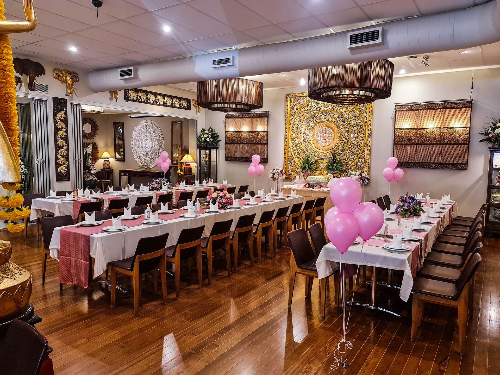 Thai Pothong Function Rooms are enhanced with authentic Thai art for sale, creating a stunning backdrop for your celebration