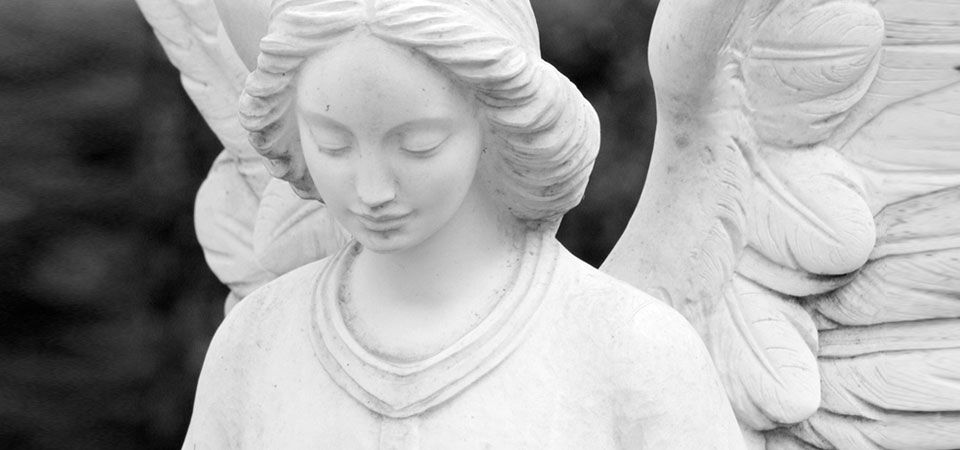 Touching memorial stones
