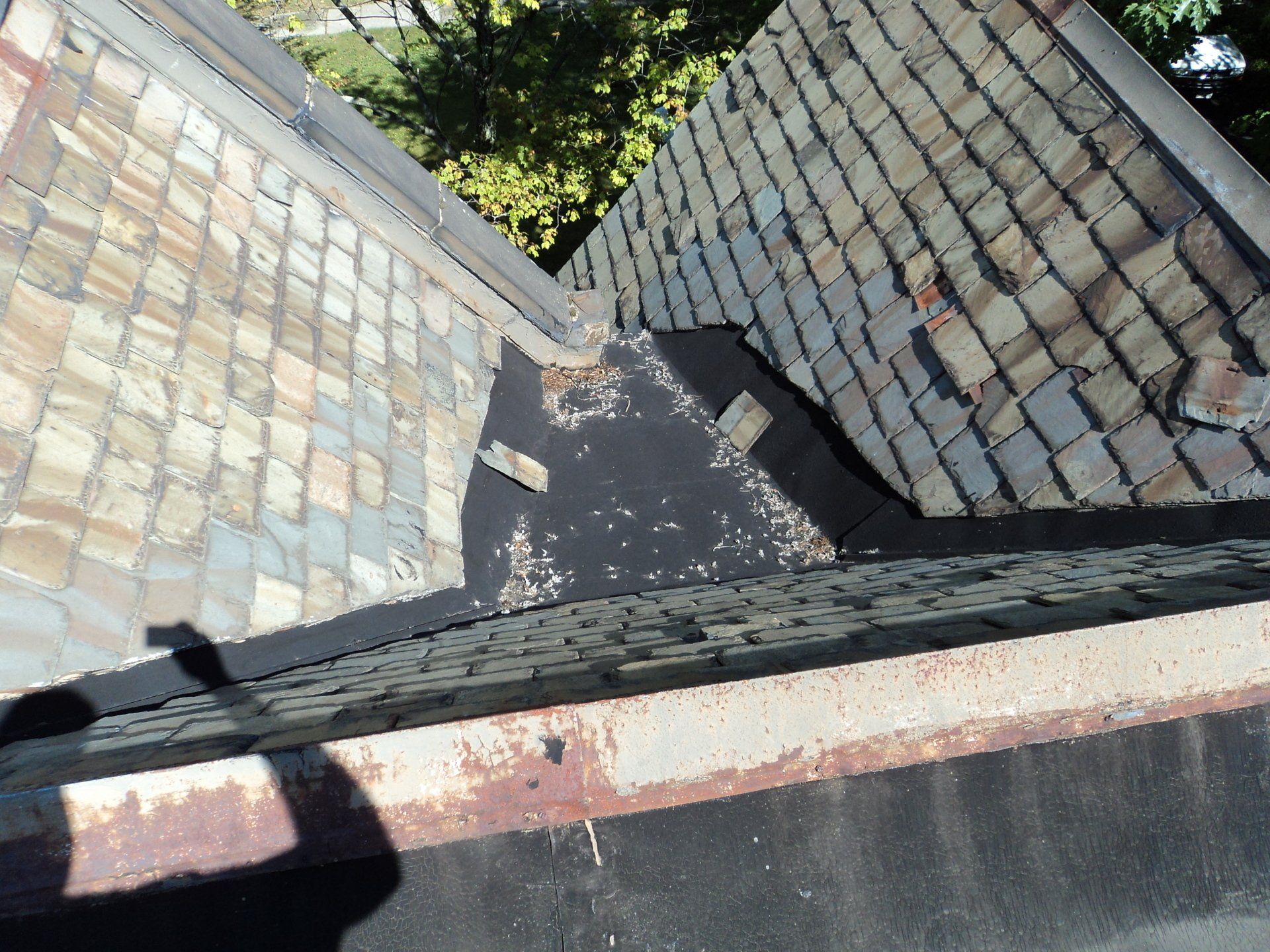 Before: Replace Valley, Flat Panel, and Parapet Wall Flashing
