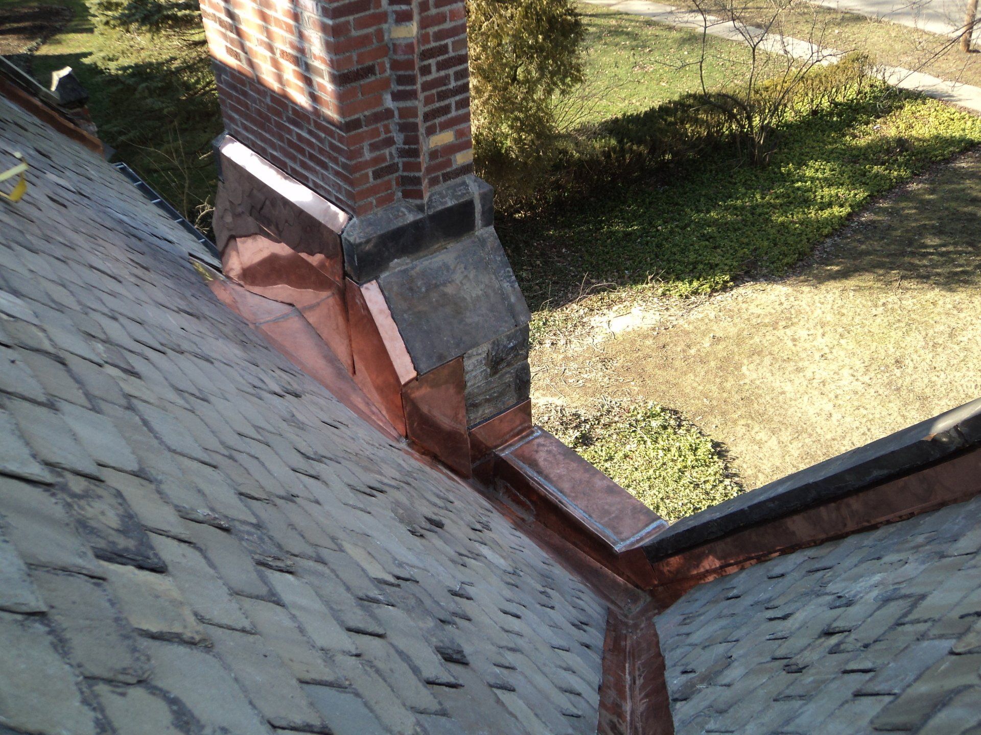 After Work Completed: Replace Valley, Chimney Saddle, and Parapet Wall Flashing