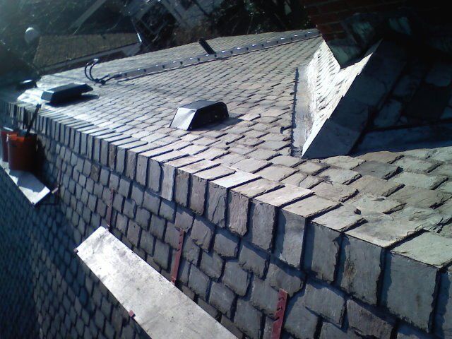 Work Completed: Ridge Tiles Reinstalled Over Ice Guard