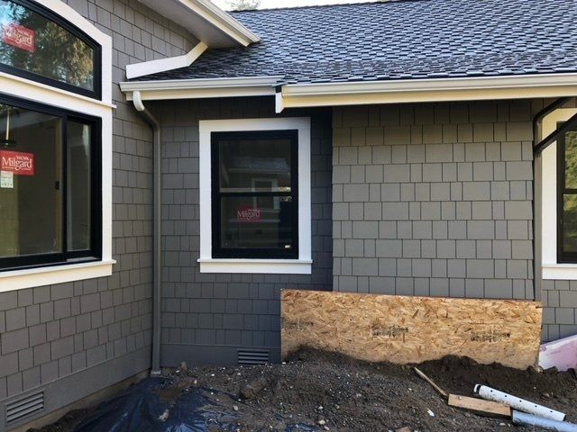 A house with a sign that says hdr on it— Tukwila, WA — Bel-Red Windows & Doors