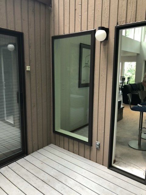 A large mirror on the side of a building — Tukwila, WA — Bel-Red Windows & Doors