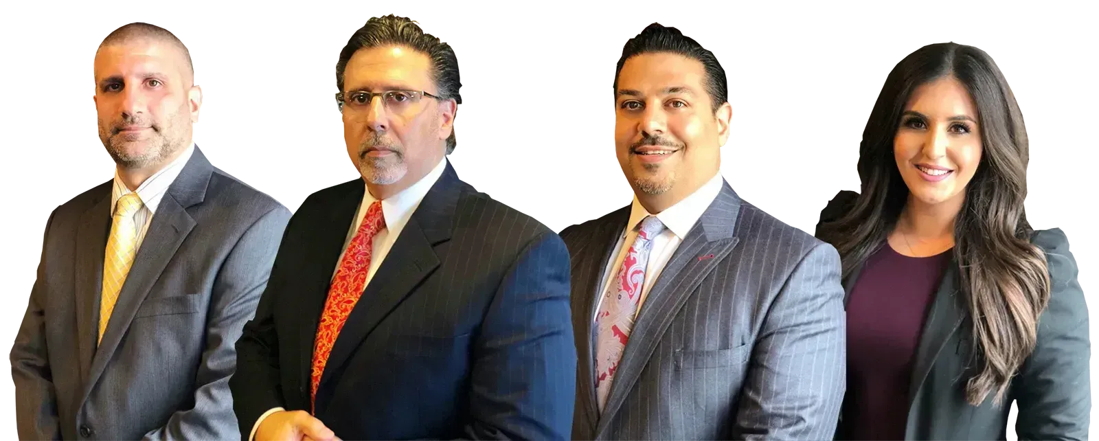 Four business professionals in suits, smiling at the viewer against a white background.