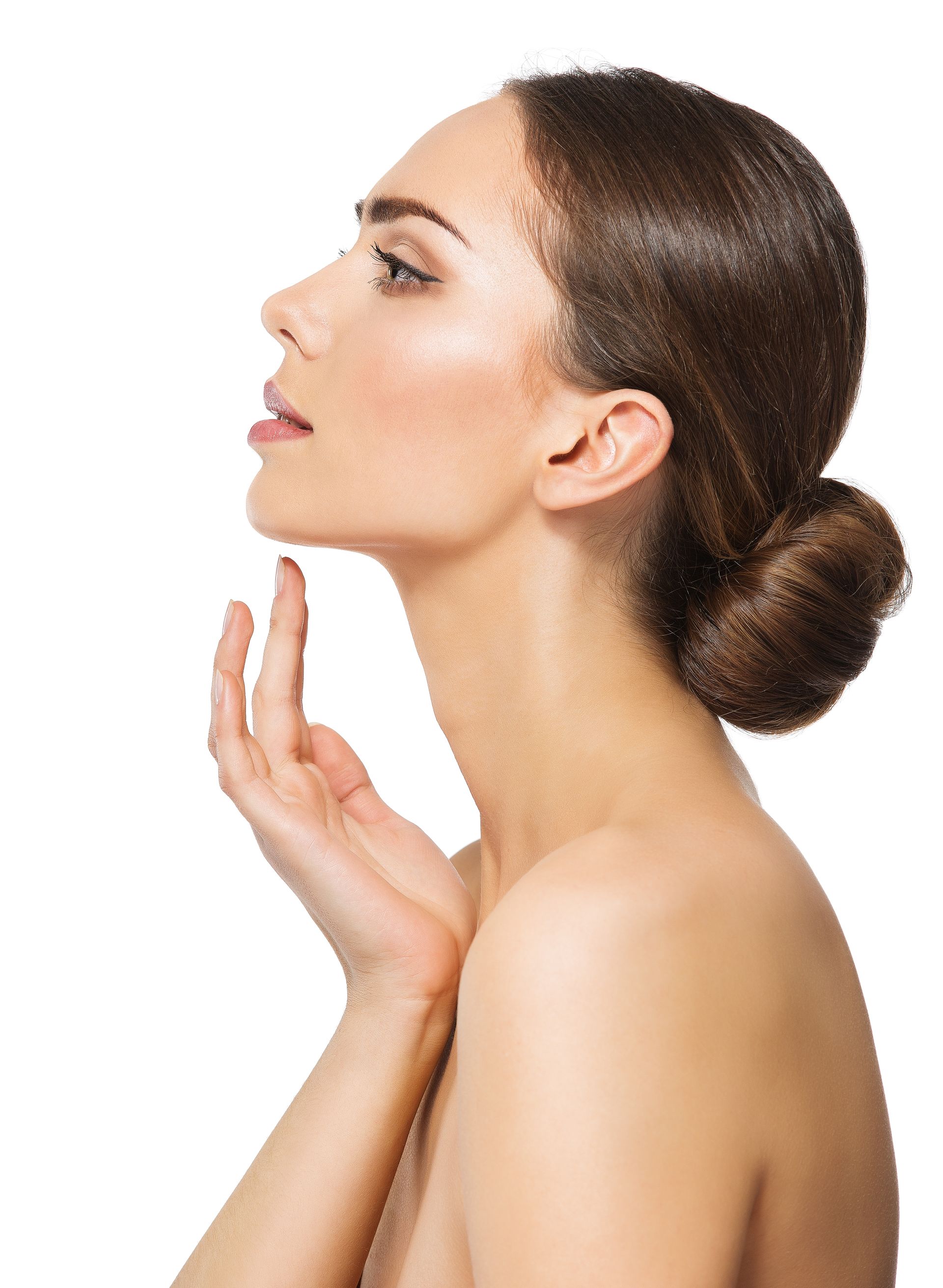 Profile view of a woman with beautiful lips and clear skin touching her jawline against a white background.