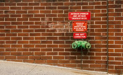 Fire standpipe on a brick wall - Fire Protection Services in Roxbury, MA