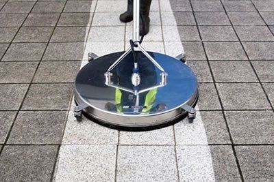 Example of driveway cleaning, paver cleaning and concrete cleaning in action.